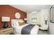 Inviting bedroom with modern furnishings and large windows at 15177 Cuzcorro Ct, Nokomis, FL 34275