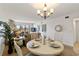Spacious living and dining area with balcony access, and views at 175 Kings Hwy # B5, Punta Gorda, FL 33983