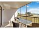 Relaxing screened-in patio with comfortable seating and beautiful views of the surrounding landscape at 175 Kings Hwy # B5, Punta Gorda, FL 33983