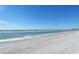 Expansive beach with gentle surf, inviting for walks and enjoying the coastal scenery at 1750 Benjamin Franklin Dr # 6F, Sarasota, FL 34236