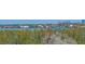 Scenic view of a waterfront community with lush landscaping and serene waterways at 1750 Benjamin Franklin Dr # 6F, Sarasota, FL 34236