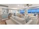 Bright and airy living room with comfortable seating and stunning waterfront views at 1750 Benjamin Franklin Dr # 6F, Sarasota, FL 34236