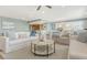Spacious living area seamlessly flows into a bright, open kitchen at 1750 Benjamin Franklin Dr # 6F, Sarasota, FL 34236