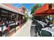 Dine al fresco at a restaurant with outdoor seating, enjoying the atmosphere and great food at 1750 Benjamin Franklin Dr # 6F, Sarasota, FL 34236
