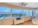 Sunroom offers breathtaking views, creating a tranquil retreat for relaxation and enjoying the scenery at 1750 Benjamin Franklin Dr # 6F, Sarasota, FL 34236