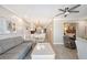 Spacious living room open to the kitchen and dining area with views into the main bedroom at 1800 Gulf N Dr # 112, Bradenton Beach, FL 34217