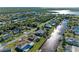 Aerial view of homes along the canal front with docks and waterway access at 18082 Eau Gallie S Cir, Port Charlotte, FL 33948