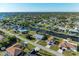 An aerial view of the community showing waterfront homes along a canal at 18082 Eau Gallie S Cir, Port Charlotte, FL 33948