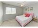 Light bedroom featuring a pink bed frame and lots of natural light at 18082 Eau Gallie S Cir, Port Charlotte, FL 33948