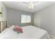 Bright bedroom with a queen size bed, neutral walls and window with blinds at 18082 Eau Gallie S Cir, Port Charlotte, FL 33948