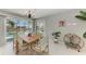 Bright dining area with modern table and seating and sliding door access to the pool area at 18082 Eau Gallie S Cir, Port Charlotte, FL 33948