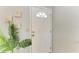 Welcoming front door with decorative glass insert, interior view at 18082 Eau Gallie S Cir, Port Charlotte, FL 33948