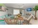 Inviting living room with stylish decor, comfortable seating, and plenty of natural light at 18082 Eau Gallie S Cir, Port Charlotte, FL 33948