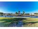 Beautiful waterfront view with lush green grass and private boat docks at 18082 Eau Gallie S Cir, Port Charlotte, FL 33948