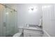 Modern bathroom featuring a glass-enclosed shower, sleek vanity, and stylish fixtures at 212 Spring Ave, Anna Maria, FL 34216