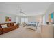Spacious bedroom featuring a cozy sitting area and soft, natural light at 216 Tenacity Ln, Sarasota, FL 34242