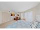 Bedroom features a comfortable bed and sitting area for relaxation and unwinding at 216 Tenacity Ln, Sarasota, FL 34242