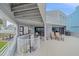 Spacious deck with ocean views and outdoor seating arrangement at 216 Tenacity Ln, Sarasota, FL 34242