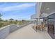 A generously-sized outdoor deck providing beach views and ample seating at 216 Tenacity Ln, Sarasota, FL 34242