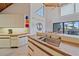 Bright kitchen features wood countertops, white cabinets, and an eat-in bar overlooking the ocean at 216 Tenacity Ln, Sarasota, FL 34242