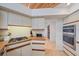 Modern kitchen features stainless steel appliances, gas stove, wood counters, and bright lighting at 216 Tenacity Ln, Sarasota, FL 34242