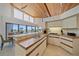 Well-lit kitchen with modern appliances, an eat-in bar, and an ocean view, combining style and functionality at 216 Tenacity Ln, Sarasota, FL 34242