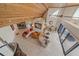 Open-concept living room with high ceilings, a wooden ceiling, tile floors, and bright lighting at 216 Tenacity Ln, Sarasota, FL 34242