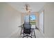 Office space with a desk and view of the beach and ocean at 216 Tenacity Ln, Sarasota, FL 34242
