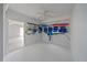 An organized storage room with beach chairs and accessories neatly stored at 216 Tenacity Ln, Sarasota, FL 34242