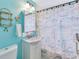 Bathroom with coastal theme and a shower curtain at 2165 Lemon Ave, Englewood, FL 34223