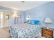 Blue bedroom with coastal decor and a dresser at 2165 Lemon Ave, Englewood, FL 34223