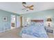 Cozy bedroom featuring plush carpet and doorway to ensuite bath at 2165 Lemon Ave, Englewood, FL 34223