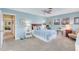 Bedroom featuring soft blue walls, plush carpeting, and a comfortable bed at 2165 Lemon Ave, Englewood, FL 34223