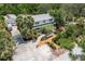 Aerial shot of a charming home with a well manicured lawn and driveway at 2165 Lemon Ave, Englewood, FL 34223