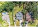 Aerial view of home with expansive fenced backyard, lush trees, and a long driveway at 2303 58Th E St, Palmetto, FL 34221