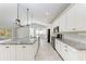 Modern kitchen featuring granite countertops, stainless steel appliances, and an island at 2303 58Th E St, Palmetto, FL 34221