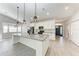 Modern kitchen with granite countertops, stainless steel appliances, and a large center island at 2303 58Th E St, Palmetto, FL 34221