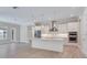 Bright and spacious kitchen featuring a large island and modern stainless steel appliances at 2319 Webber St, Sarasota, FL 34239