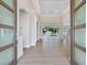 An open-concept living room with tile flooring and a view of the pool at 2319 Webber St, Sarasota, FL 34239