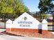 Entrance sign for Southside School, surrounded by a black metal fence and landscaping at 2319 Webber St, Sarasota, FL 34239