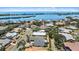 Panoramic aerial view showcasing a coastal neighborhood with waterfront properties and lush tropical landscaping at 238 Lookout Point Dr, Osprey, FL 34229