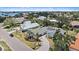 Beautiful aerial view of neighborhood featuring mature trees, waterfront views, and well maintained landscaping at 238 Lookout Point Dr, Osprey, FL 34229