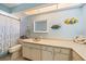 Charming bathroom with coastal accents and marine-themed decor at 238 Lookout Point Dr, Osprey, FL 34229