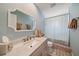Stylish bathroom with elegant vanity and ample natural light at 238 Lookout Point Dr, Osprey, FL 34229