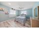 Cozy bedroom with blue and white color scheme and coastal accents at 238 Lookout Point Dr, Osprey, FL 34229