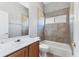 Bathroom featuring tile surround, tub, and vanity at 246 Petrel Trl, Bradenton, FL 34212