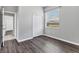 Bedroom features wood floors, a window, and a closet at 246 Petrel Trl, Bradenton, FL 34212