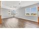 Open concept living room with a ceiling fan, and plenty of light at 246 Petrel Trl, Bradenton, FL 34212