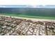 Stunning aerial view of the community, showcasing its proximity to the beautiful beach at 2601 Gulf N Dr # 317, Bradenton Beach, FL 34217