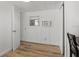 Bright bedroom features a large window and updated laminate flooring at 2601 Gulf N Dr # 317, Bradenton Beach, FL 34217